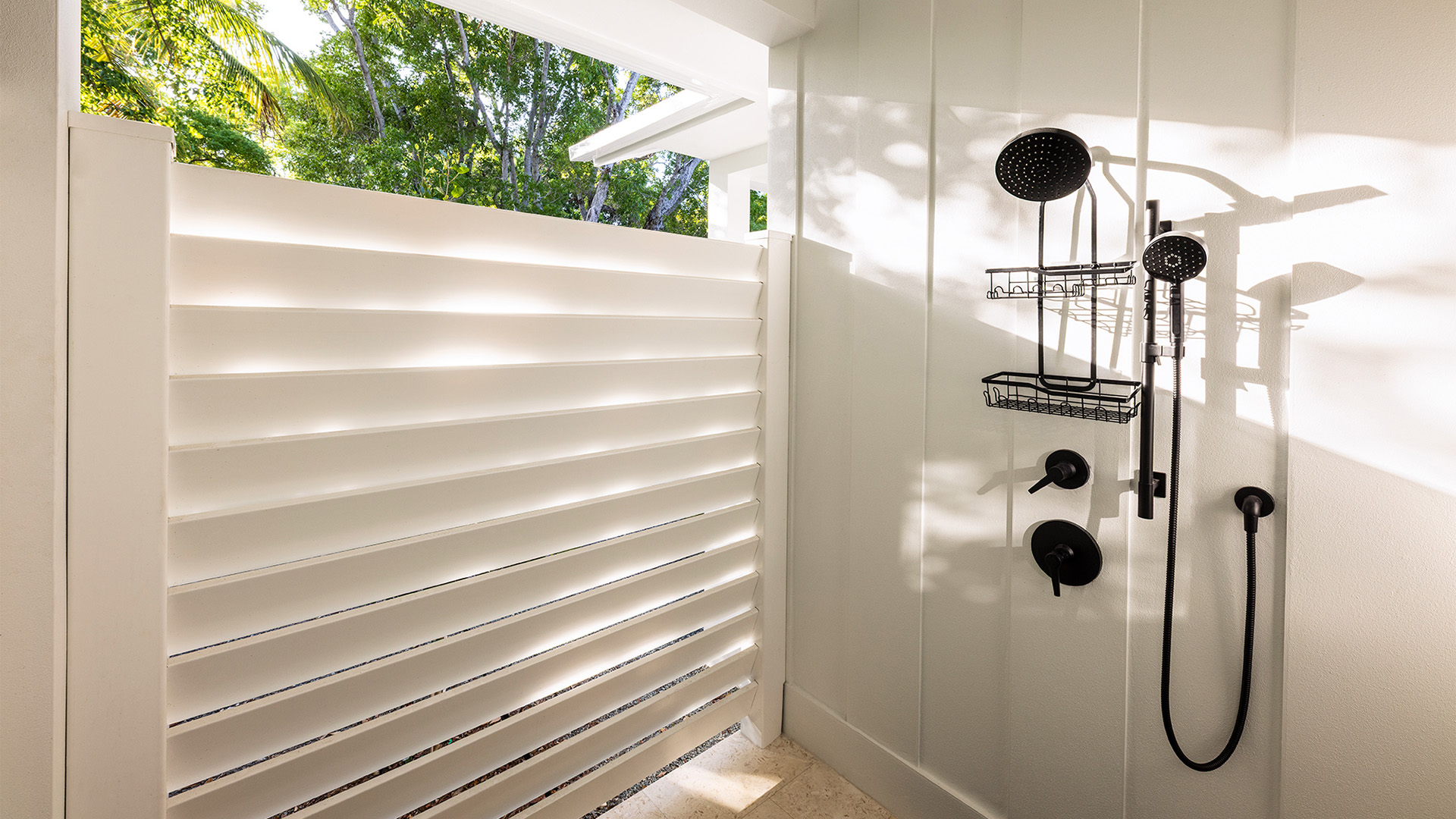 a shower in a white room