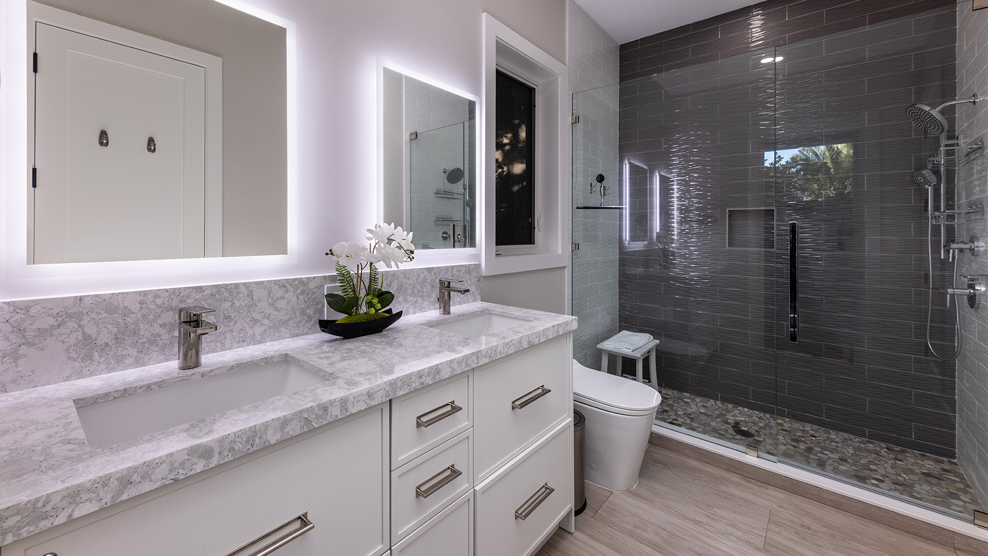 a bathroom with a shower and sink