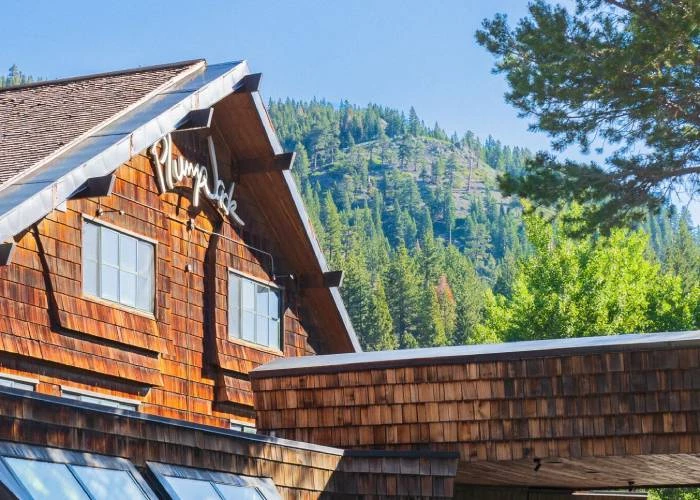 a house with a hill in the background