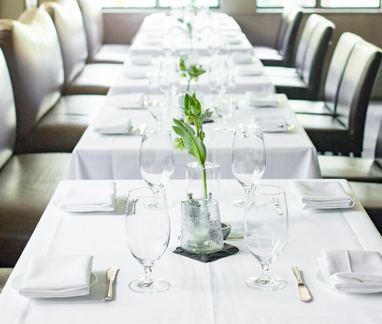 View of a large dining area ready for having a business meeting
