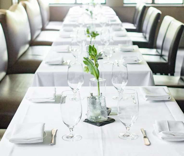 View of a large dining area ready for having a business meeting