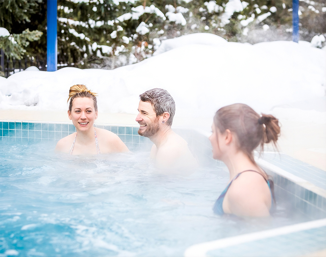 a group of people in a hot tub