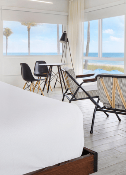 a room with a table and chairs and a table and chairs