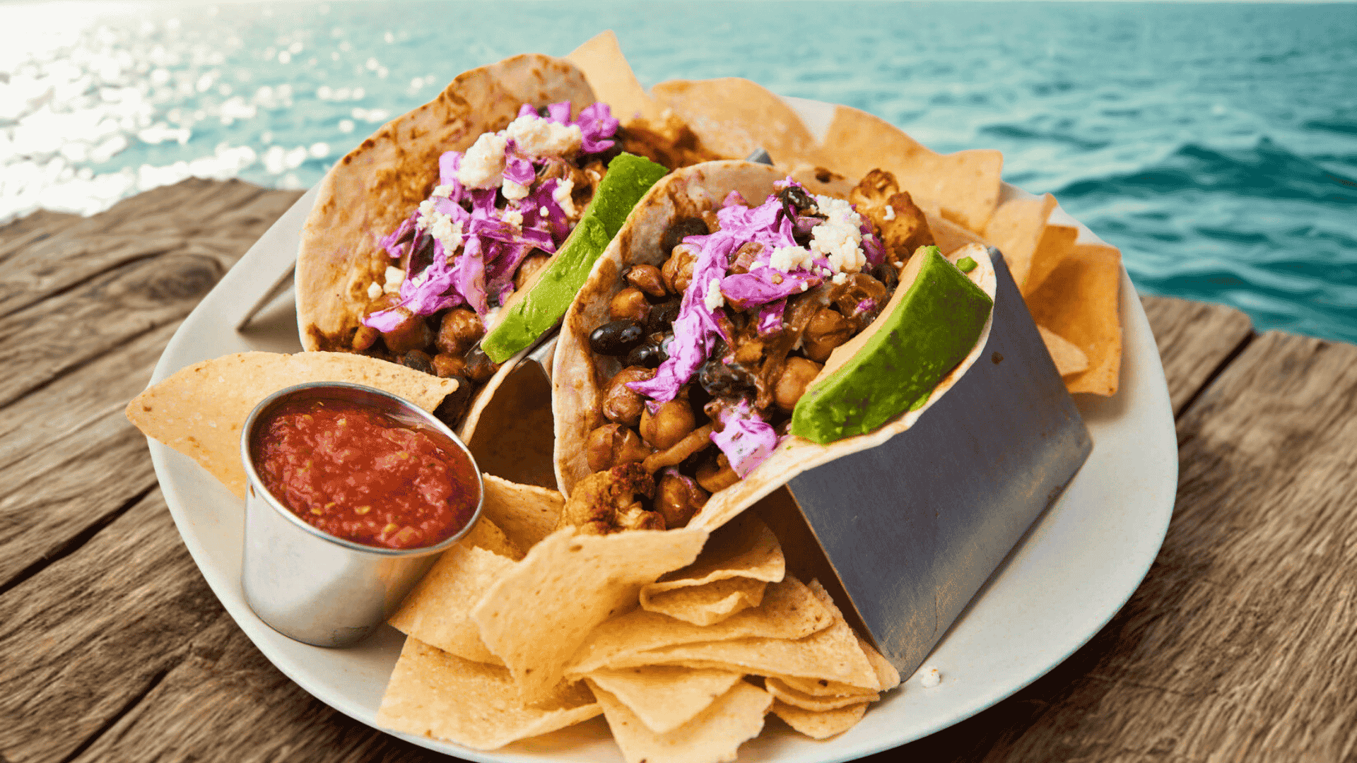 a plate of food with salsa and tortillas