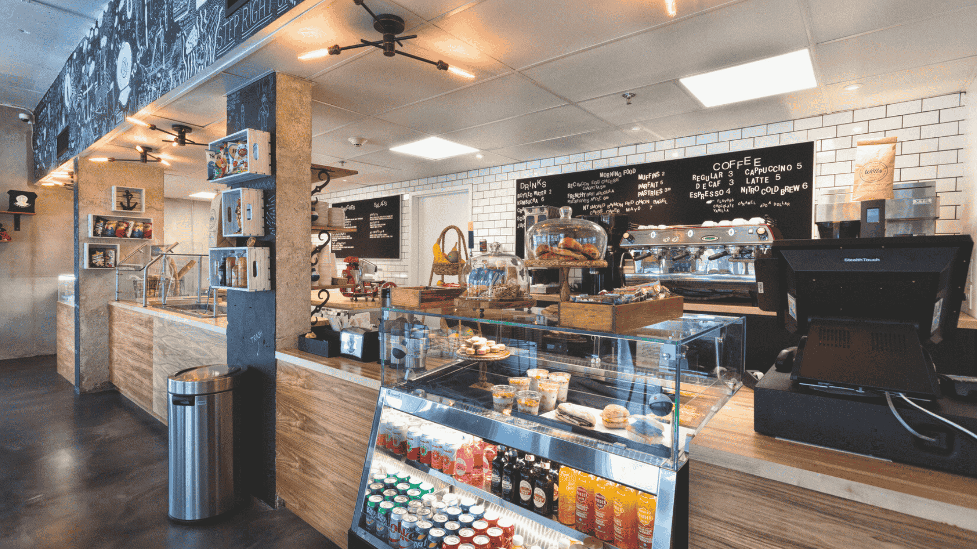 a coffee shop with a glass case