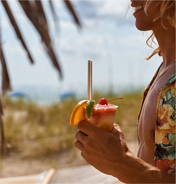 woman enjoying cocktail 