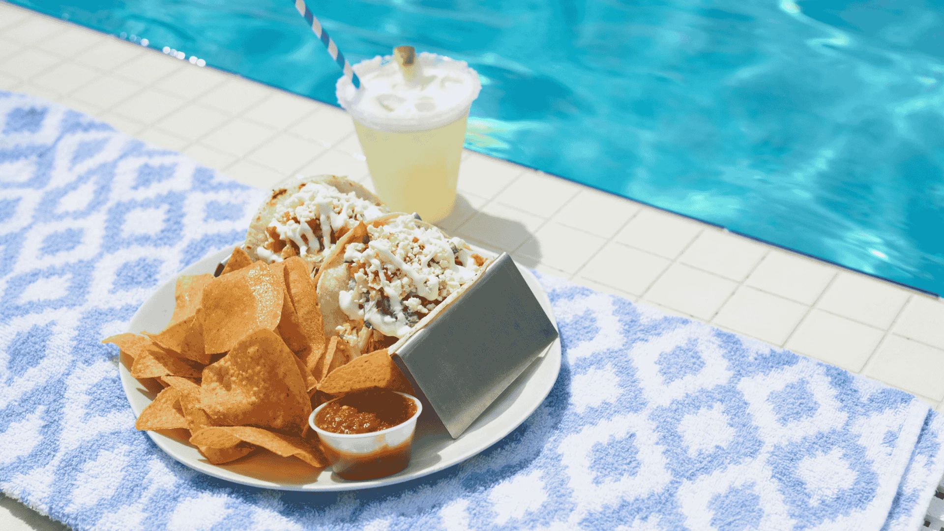 a plate of food next to a drink