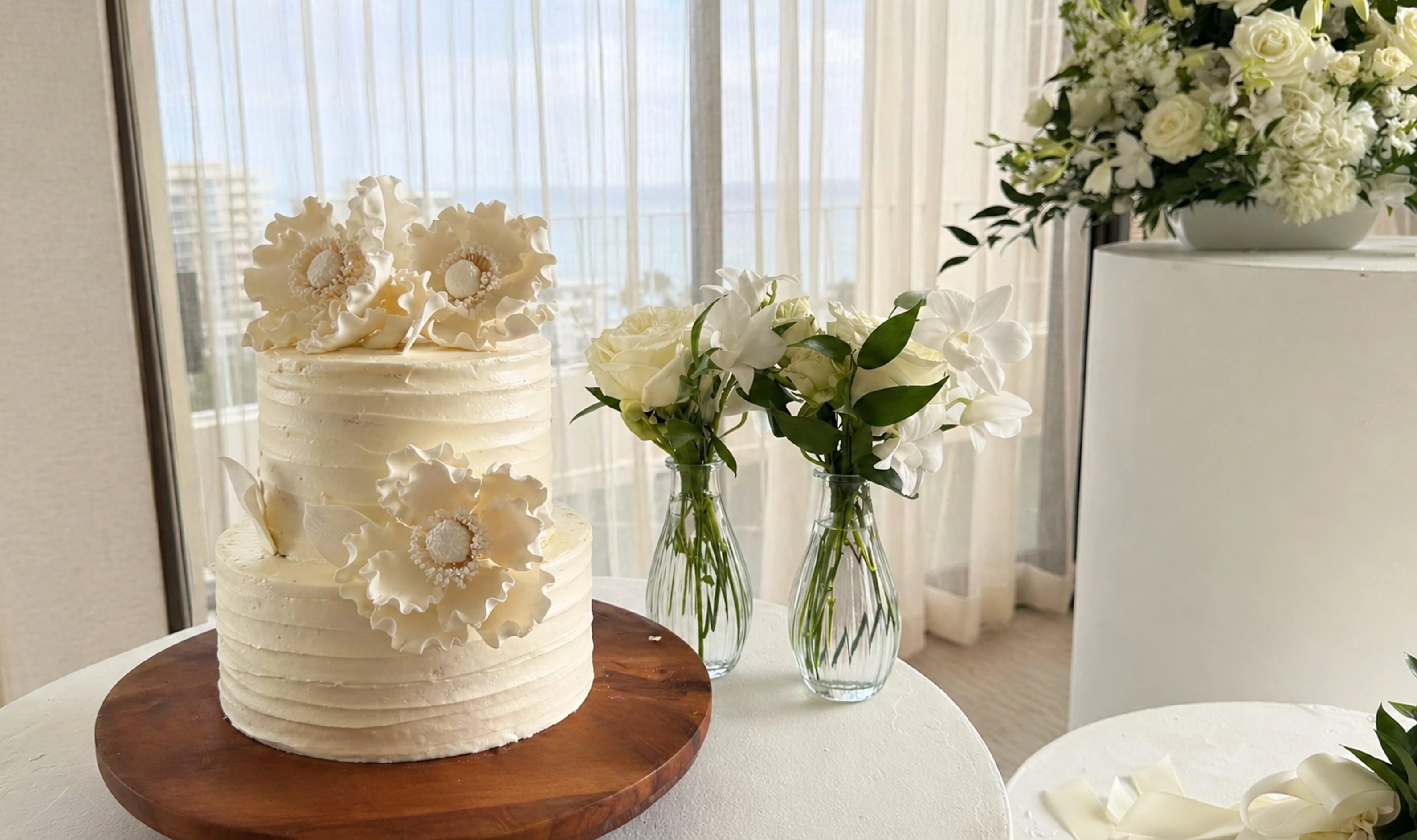 a cake and flowers on a table