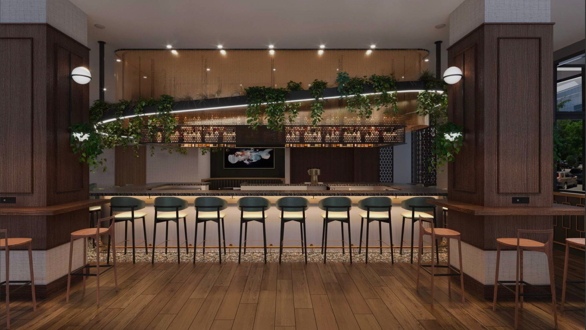 a bar with chairs and a bar