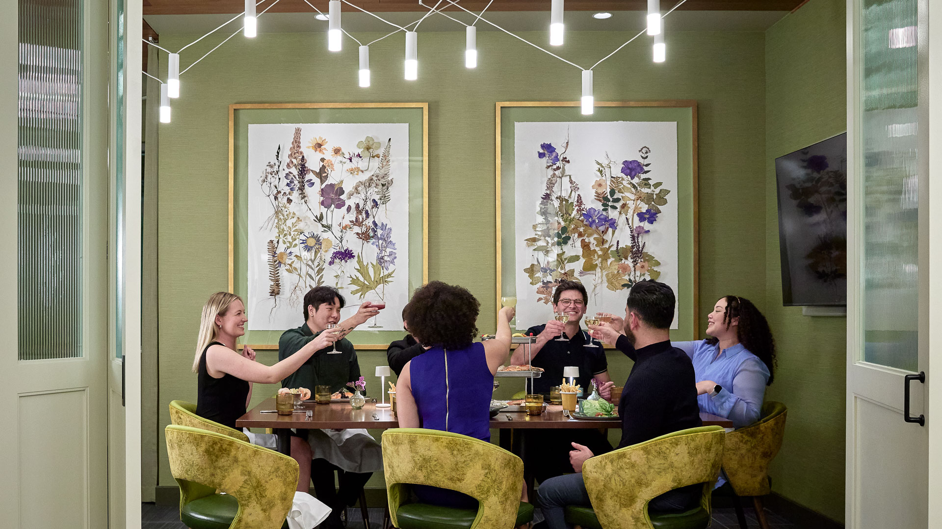 a group of people sitting at a table
