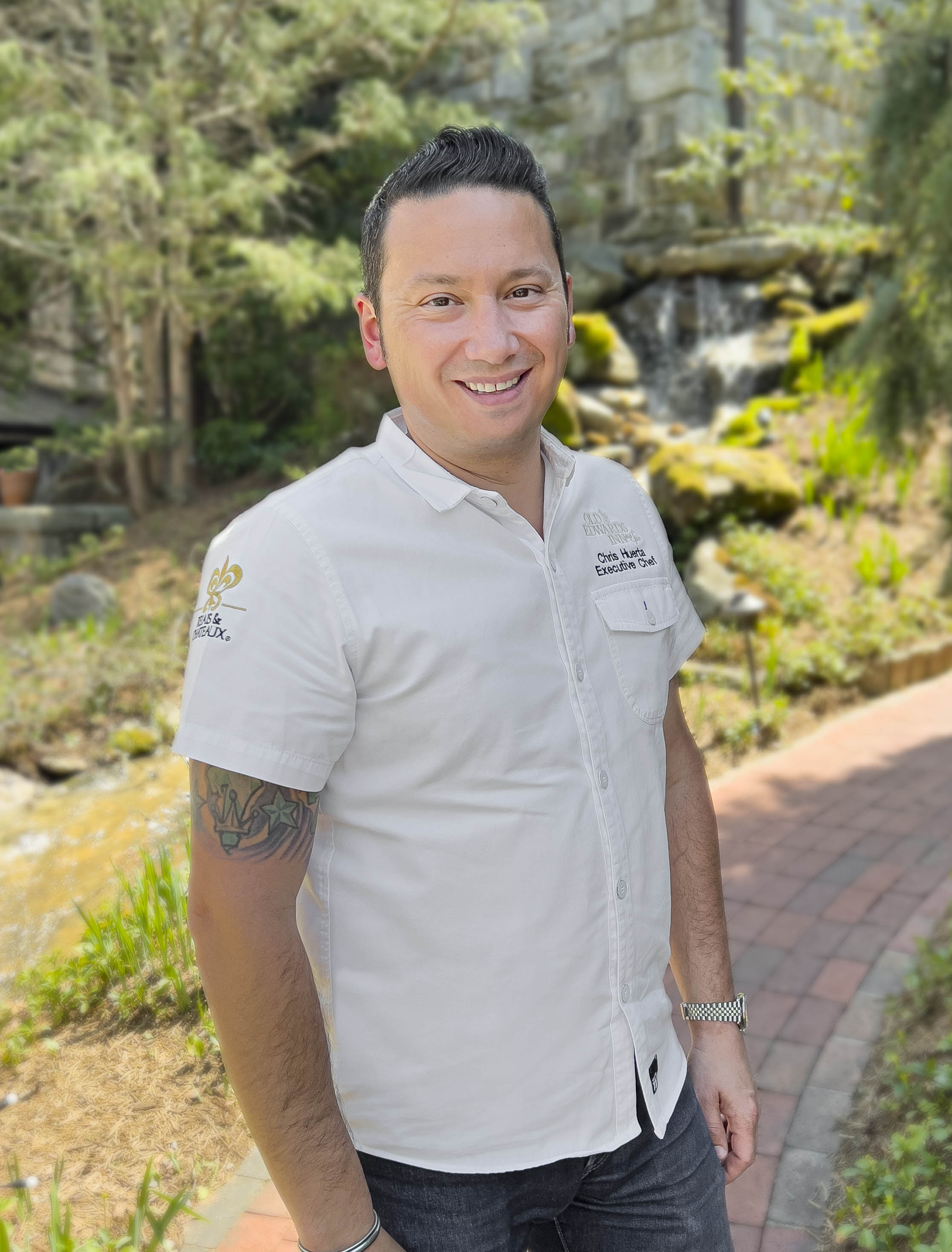 a man smiling at camera