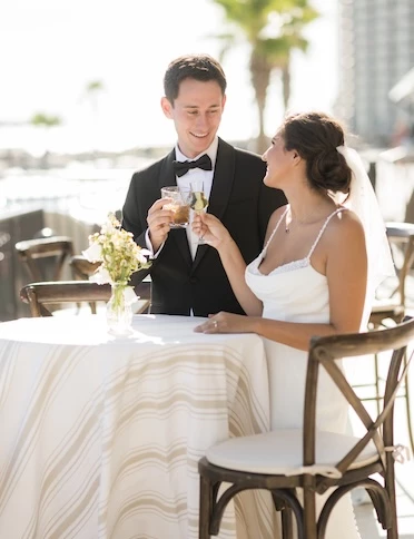 a man and woman sitting at a table