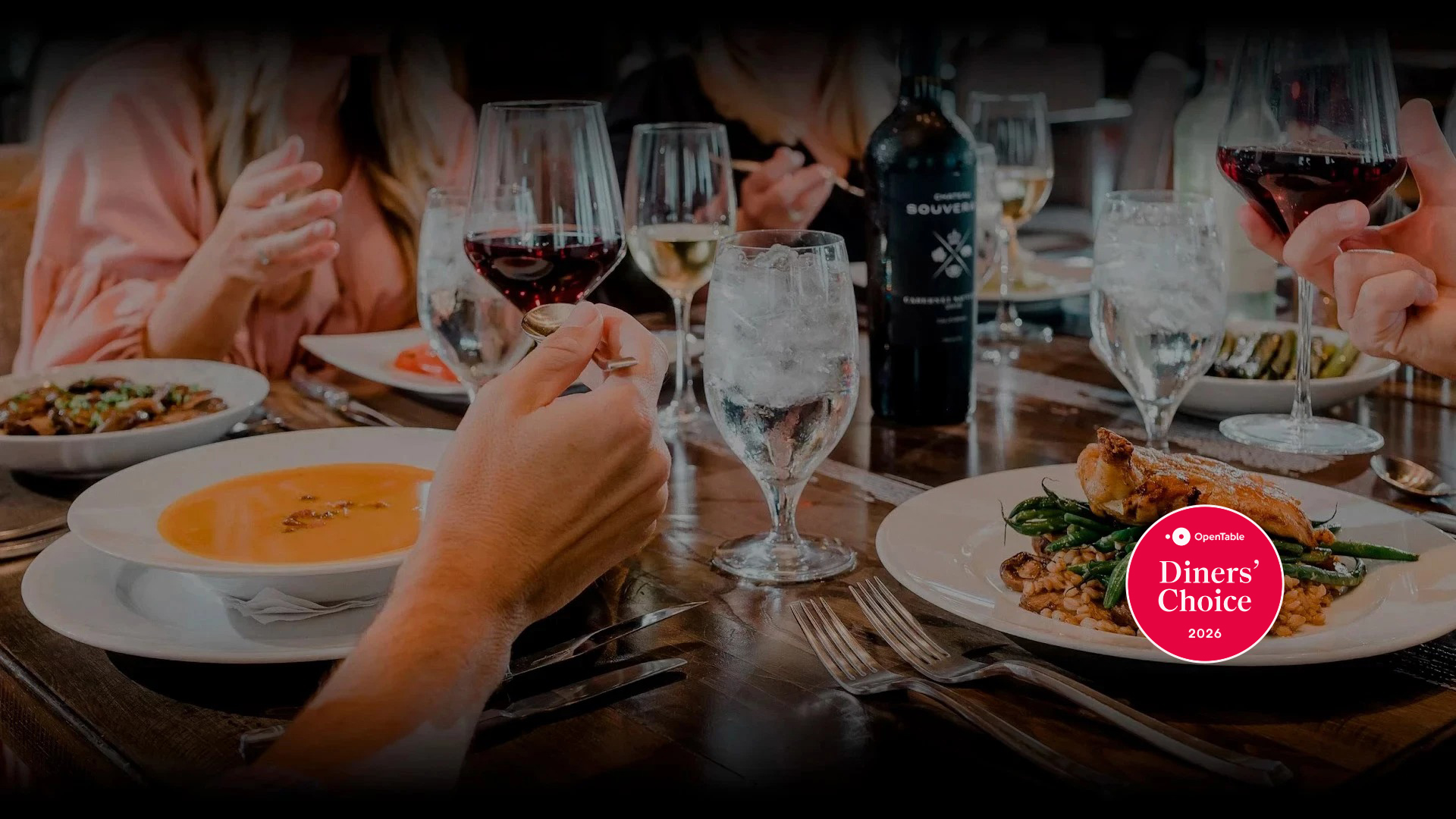 a group of people eating at a table