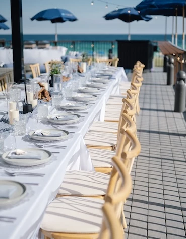 a table set for a dinner party next