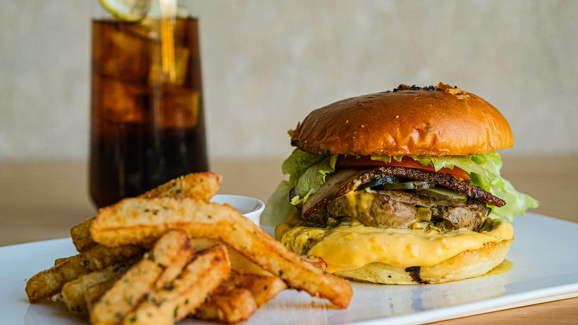 a burger and fries on a plate
