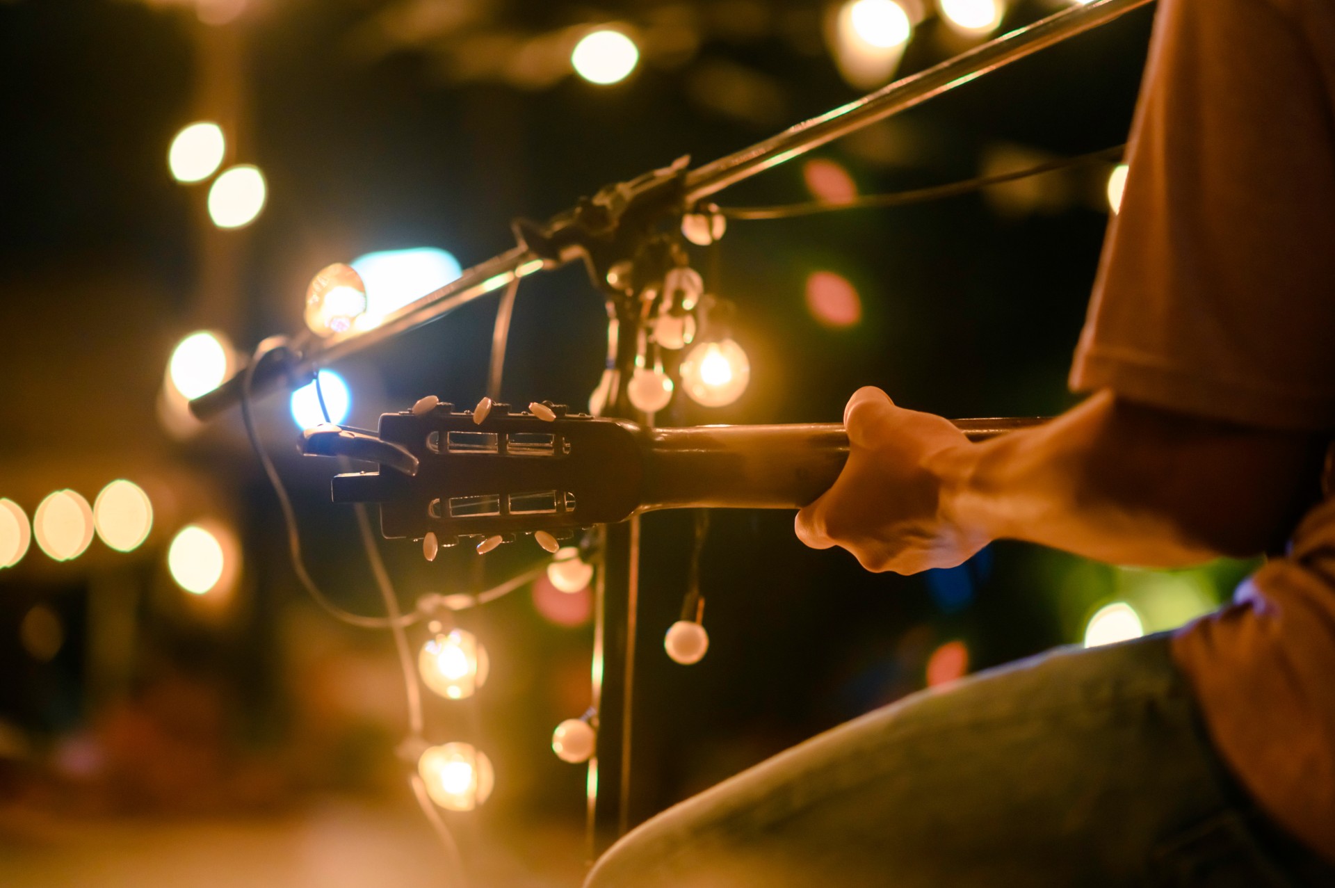 a person holding a guitar