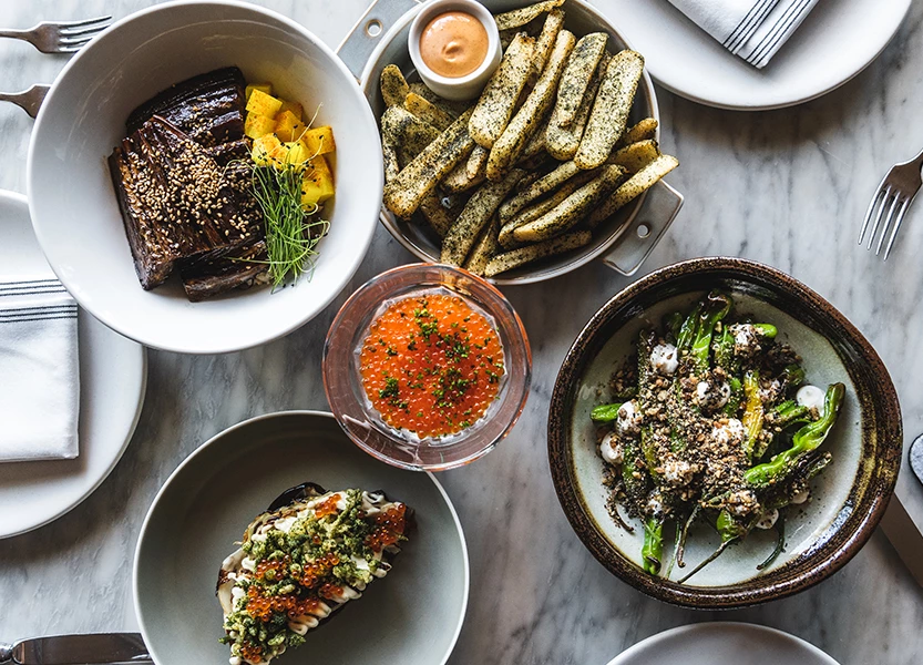 a table with plates of food