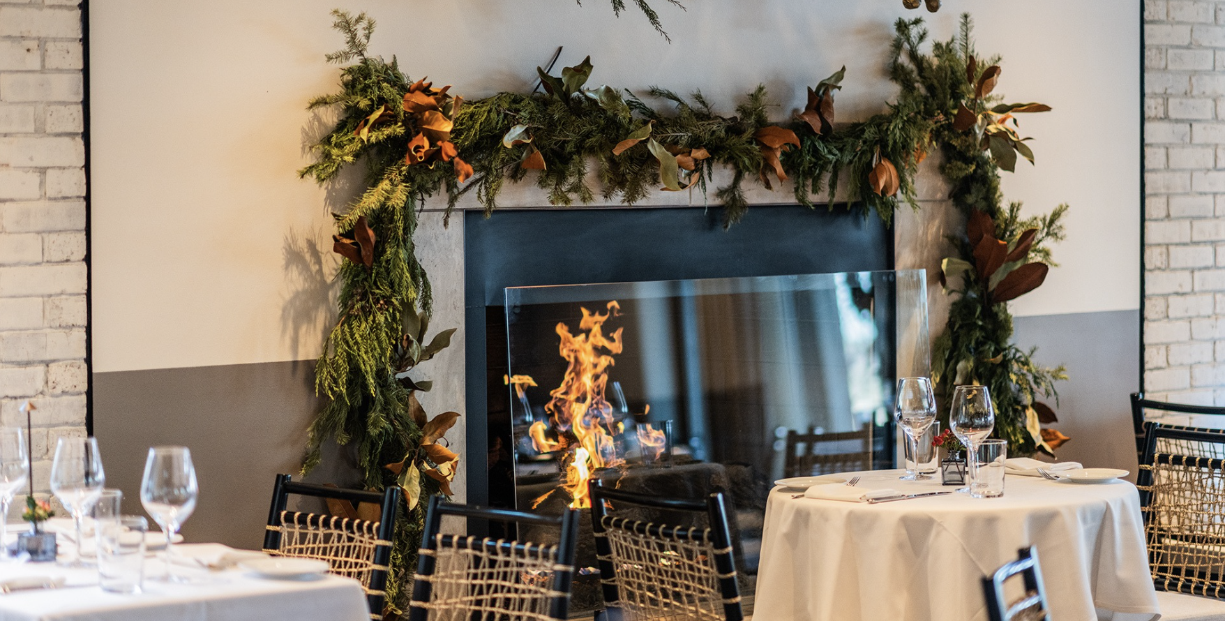 a fireplace with a fire in the background