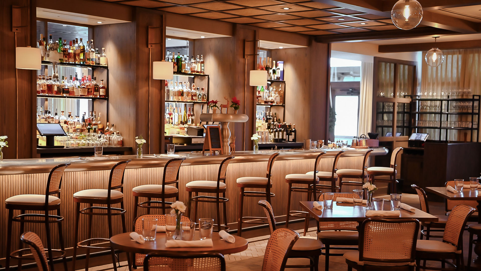 a restaurant with tables and chairs
