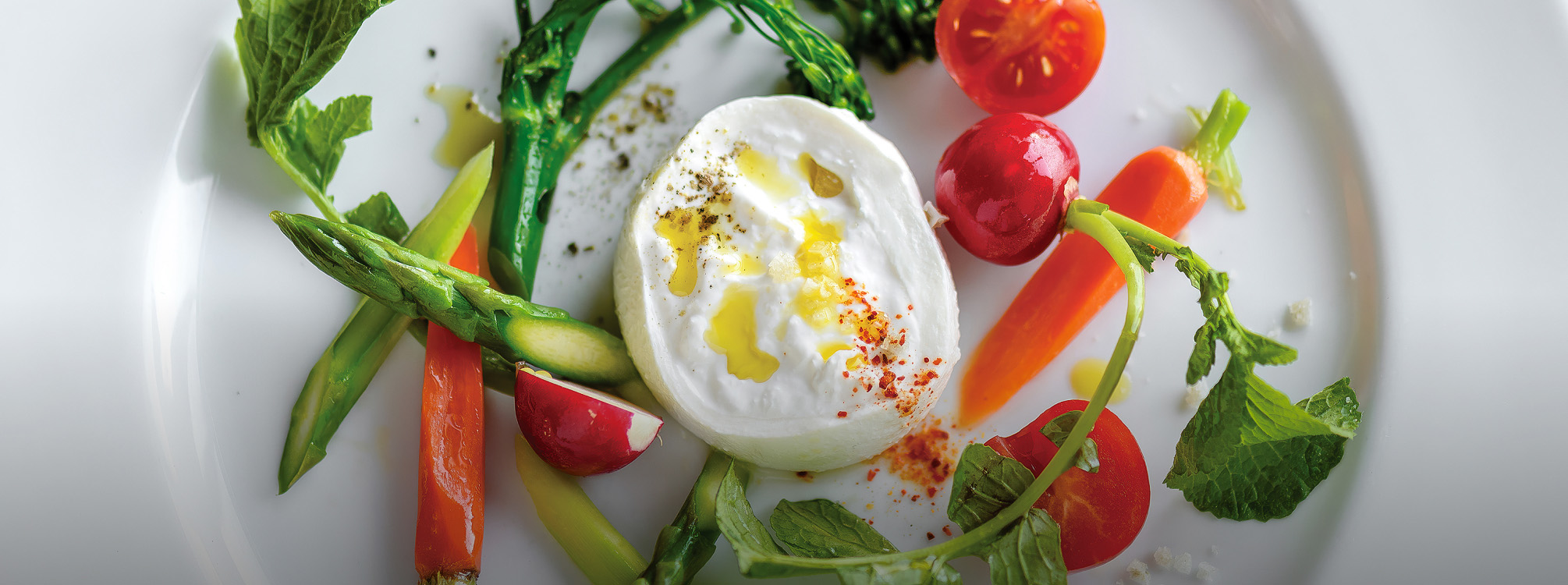 a plate of food with vegetables