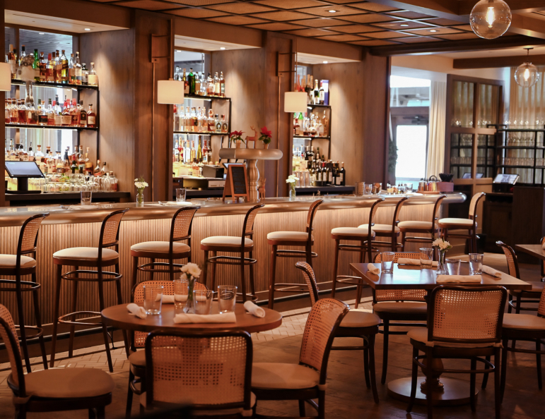 a restaurant with tables and chairs