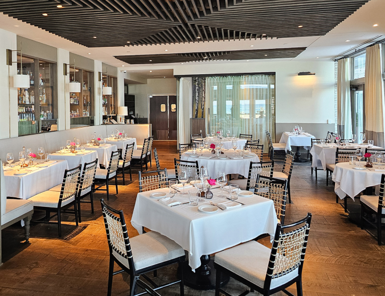 a room with tables and chairs