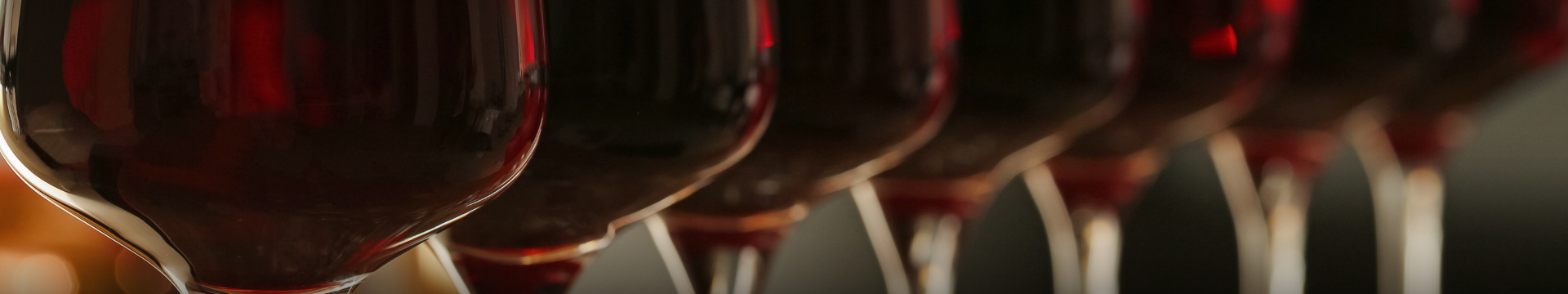 close up of a couple of wine glasses