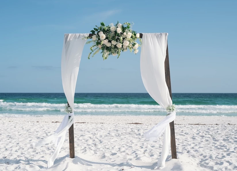a wedding arch on a beach