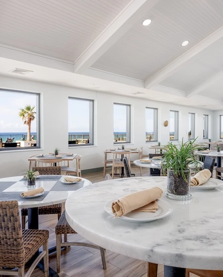 a room with tables and chairs