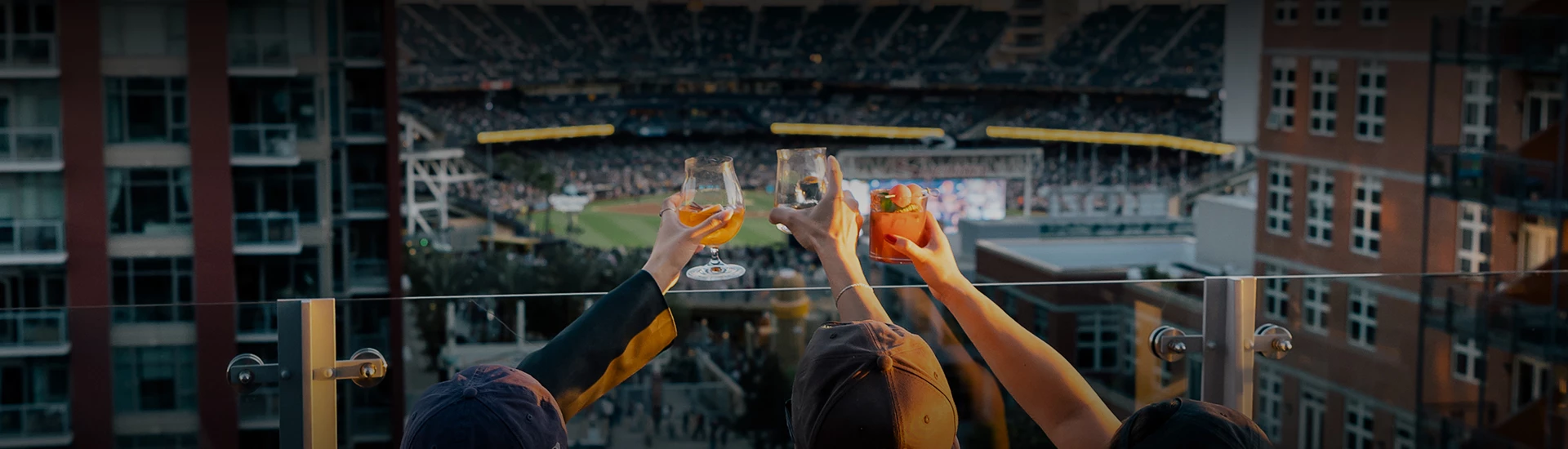 a group of people holding drinks