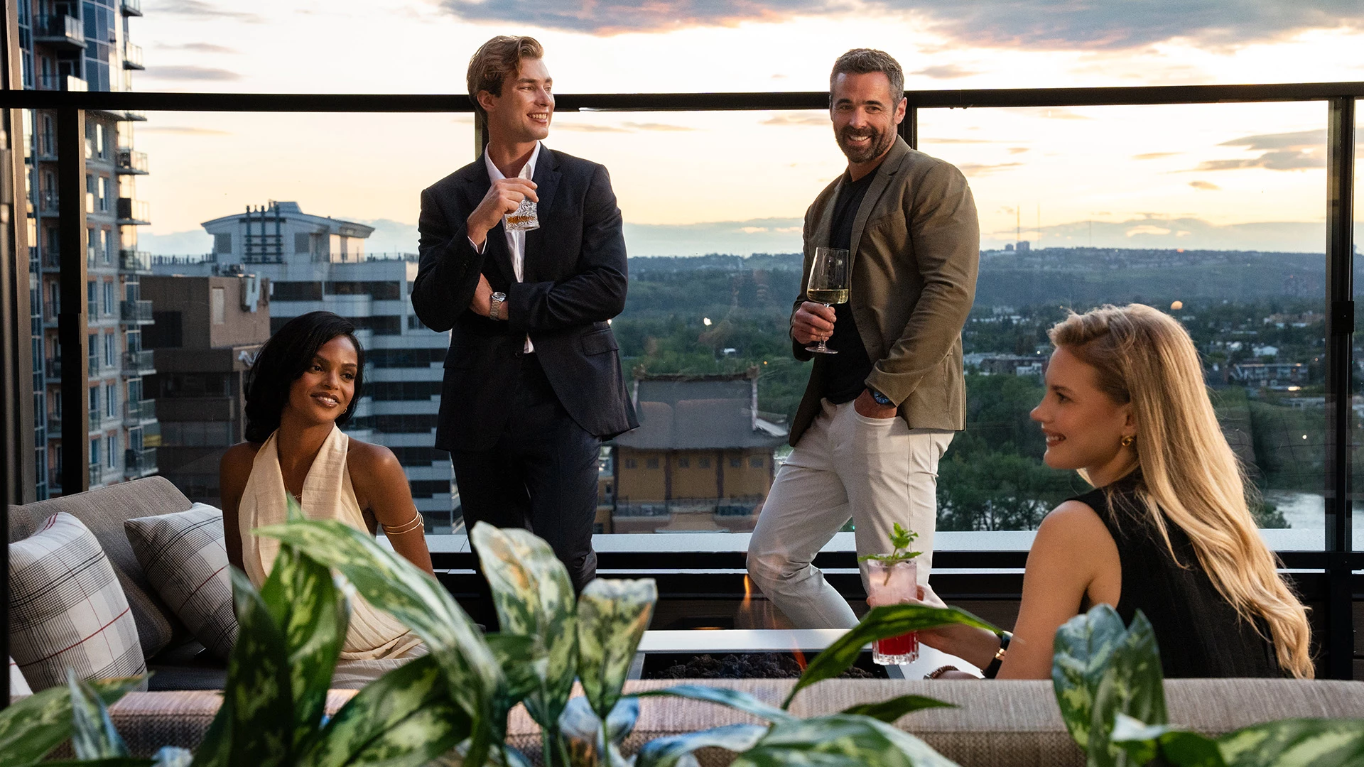 a group of people standing on a balcony