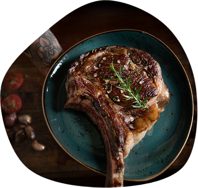 a piece of meat on a blue plate
