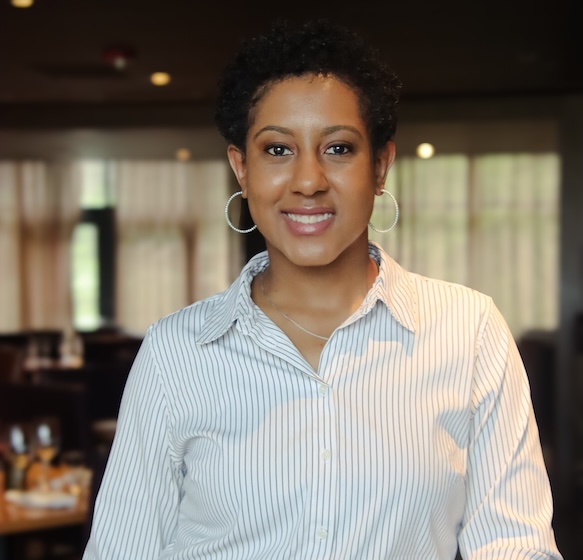a woman smiling at camera