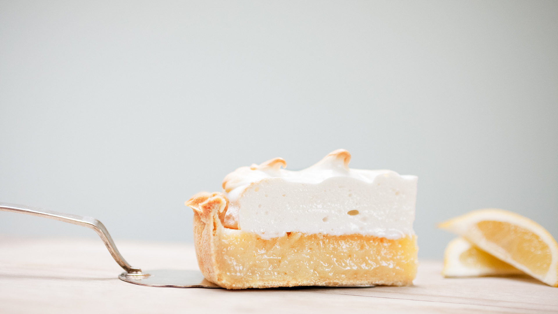 a slice of pie with a white layer on top