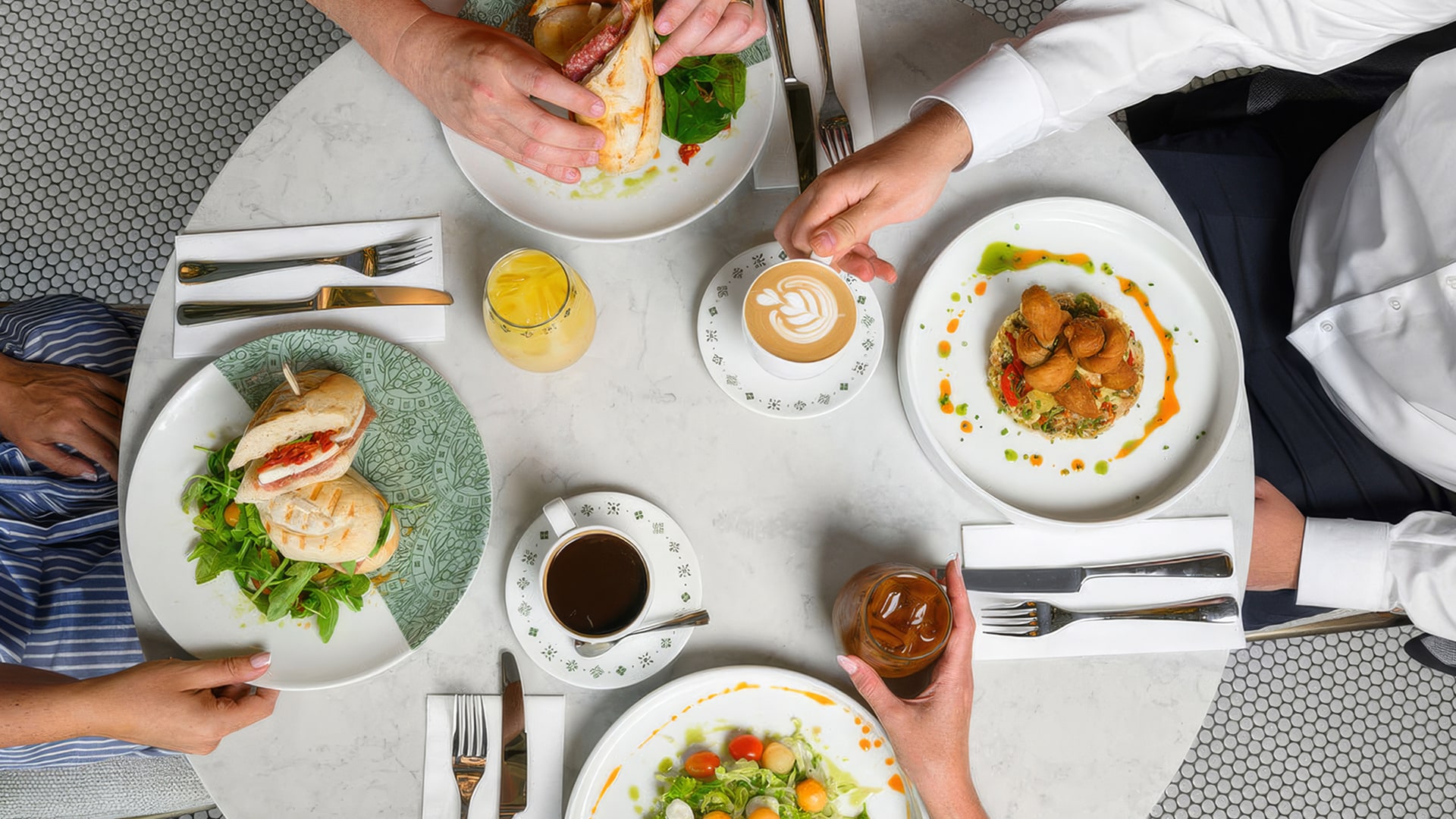 a group of people eating at a table