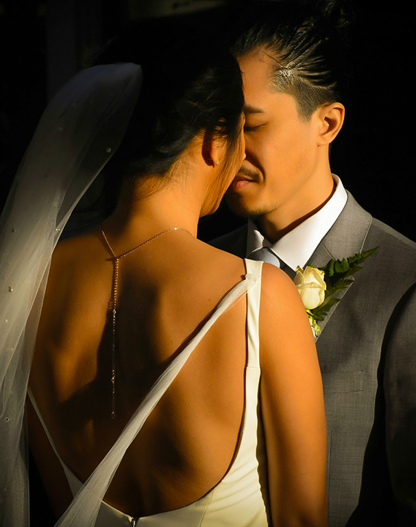 a man and woman kissing