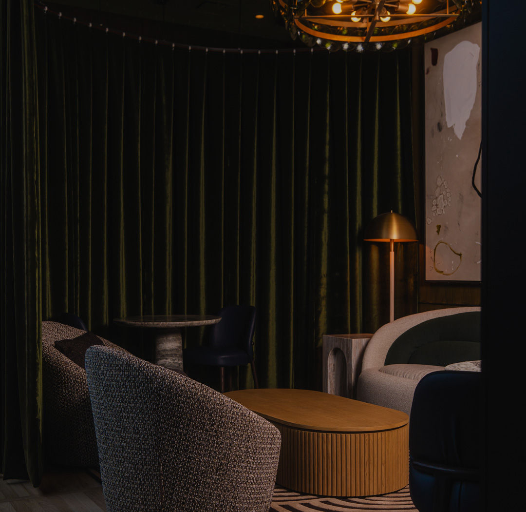 a room with a chandelier and chairs