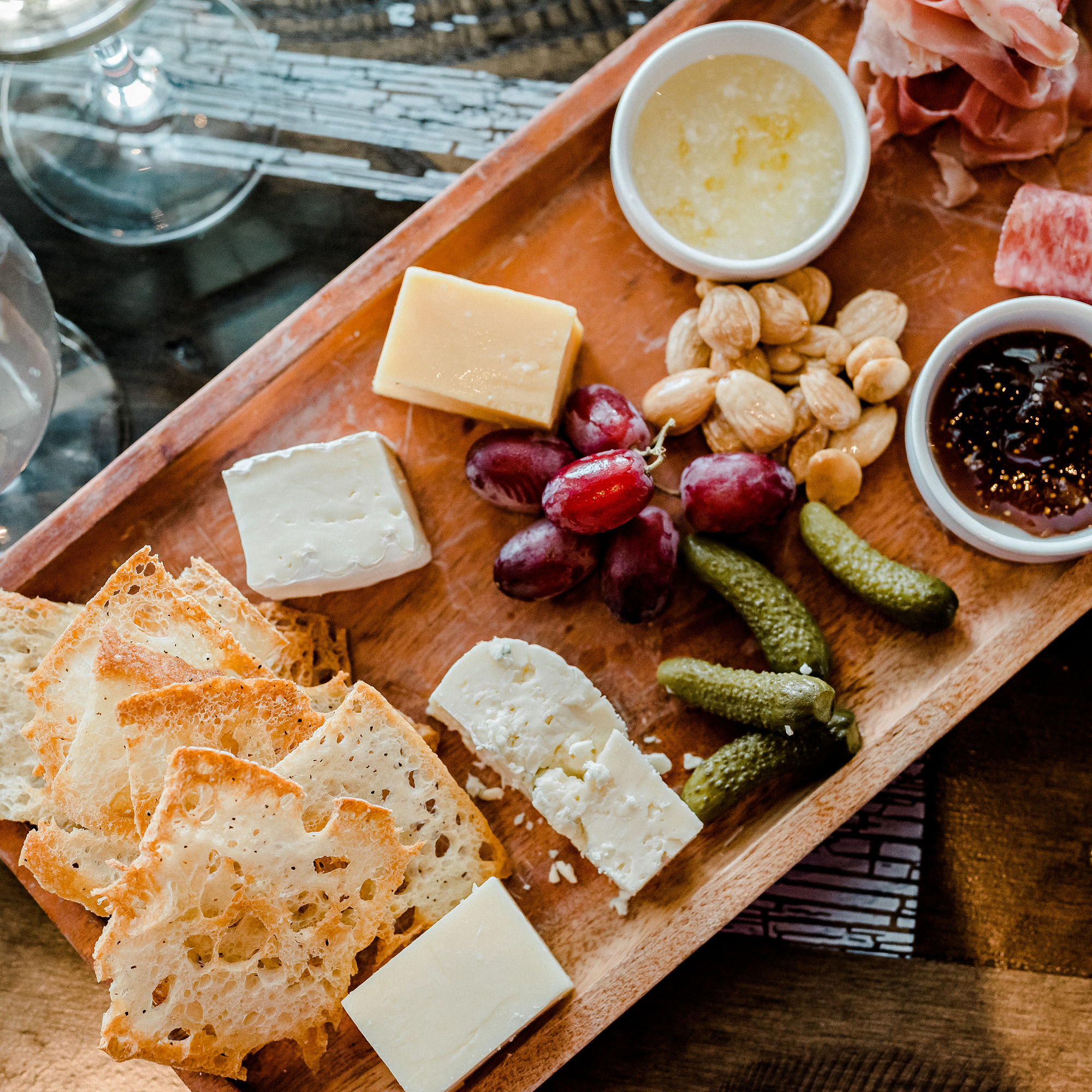 a wooden plate of food
