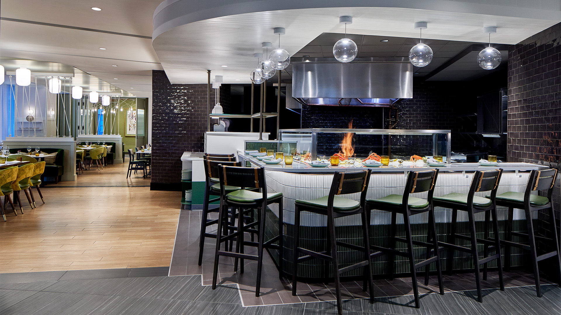 a restaurant with a fire on the counter