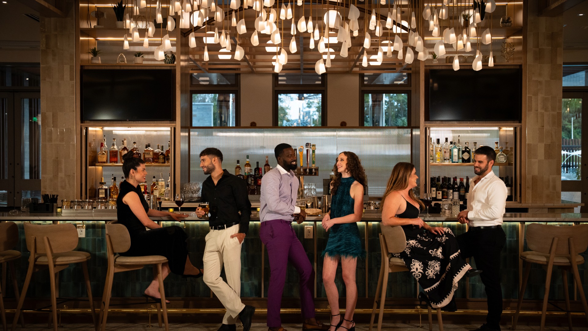 a group of people in a bar