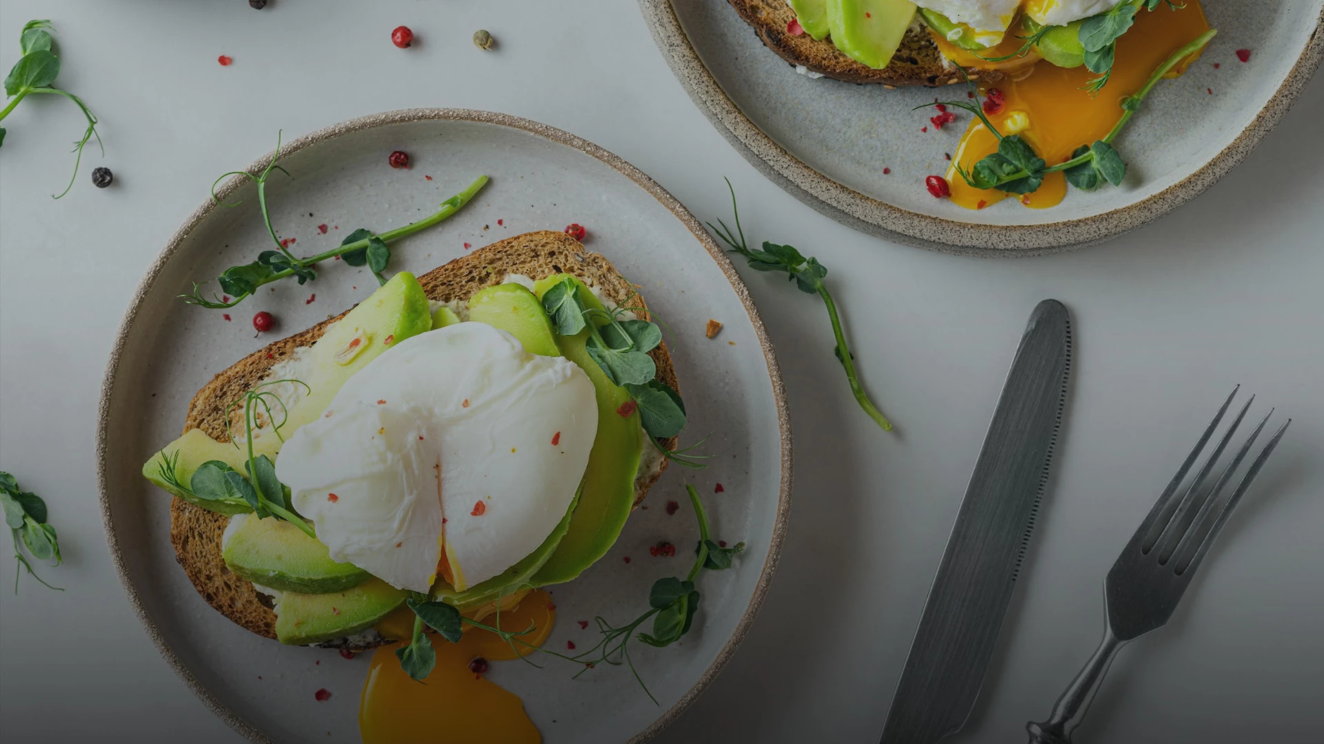 a plate of food with a poached egg on top