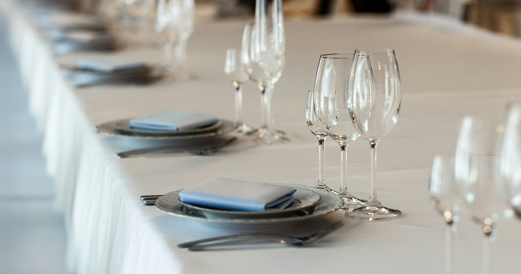 a table with plates and glasses