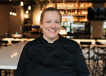 a woman smiling at camera