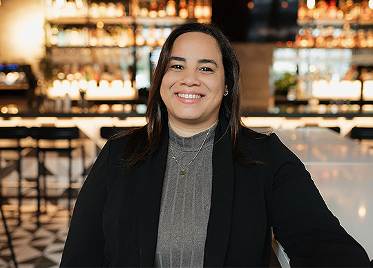 a woman smiling at camera