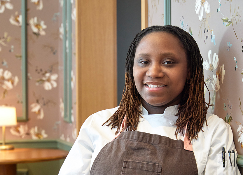 a woman wearing a chef's apron