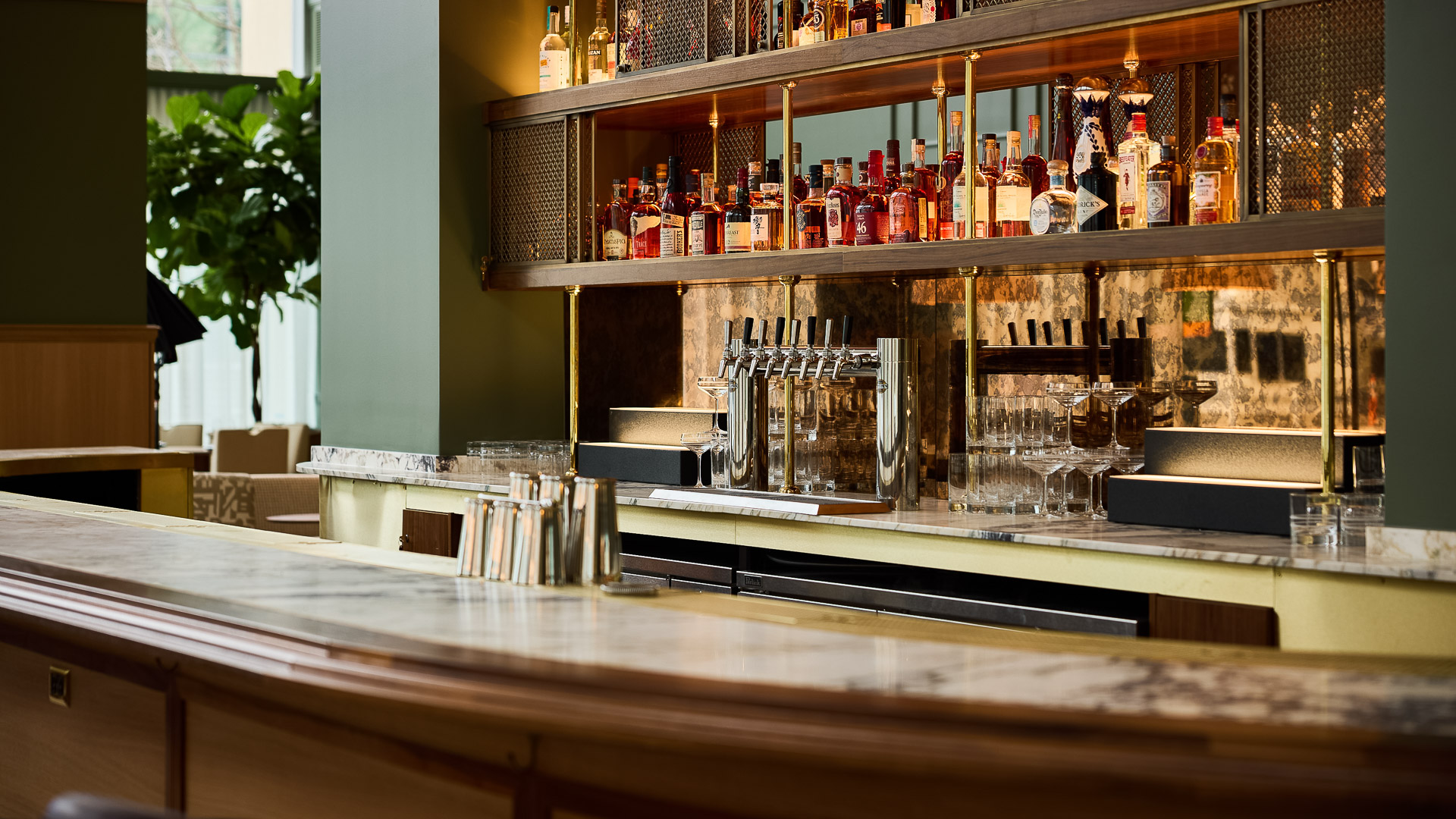 a bar with bottles of alcohol