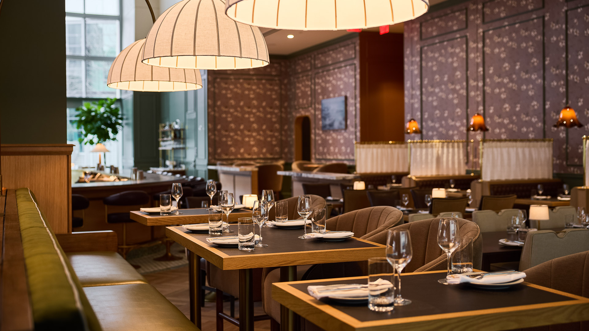 a restaurant with tables and chairs