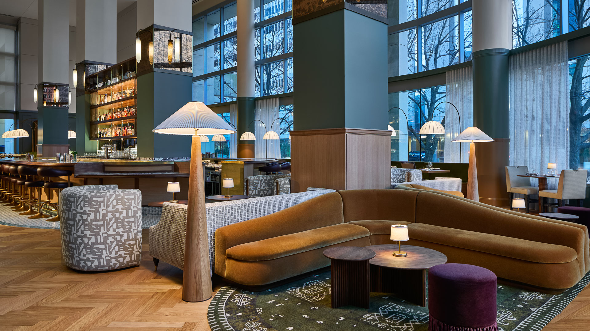 a room with a couch and a lamp