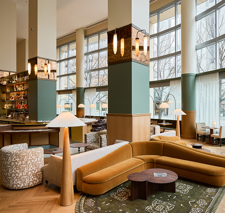 a large room with a couch and a table