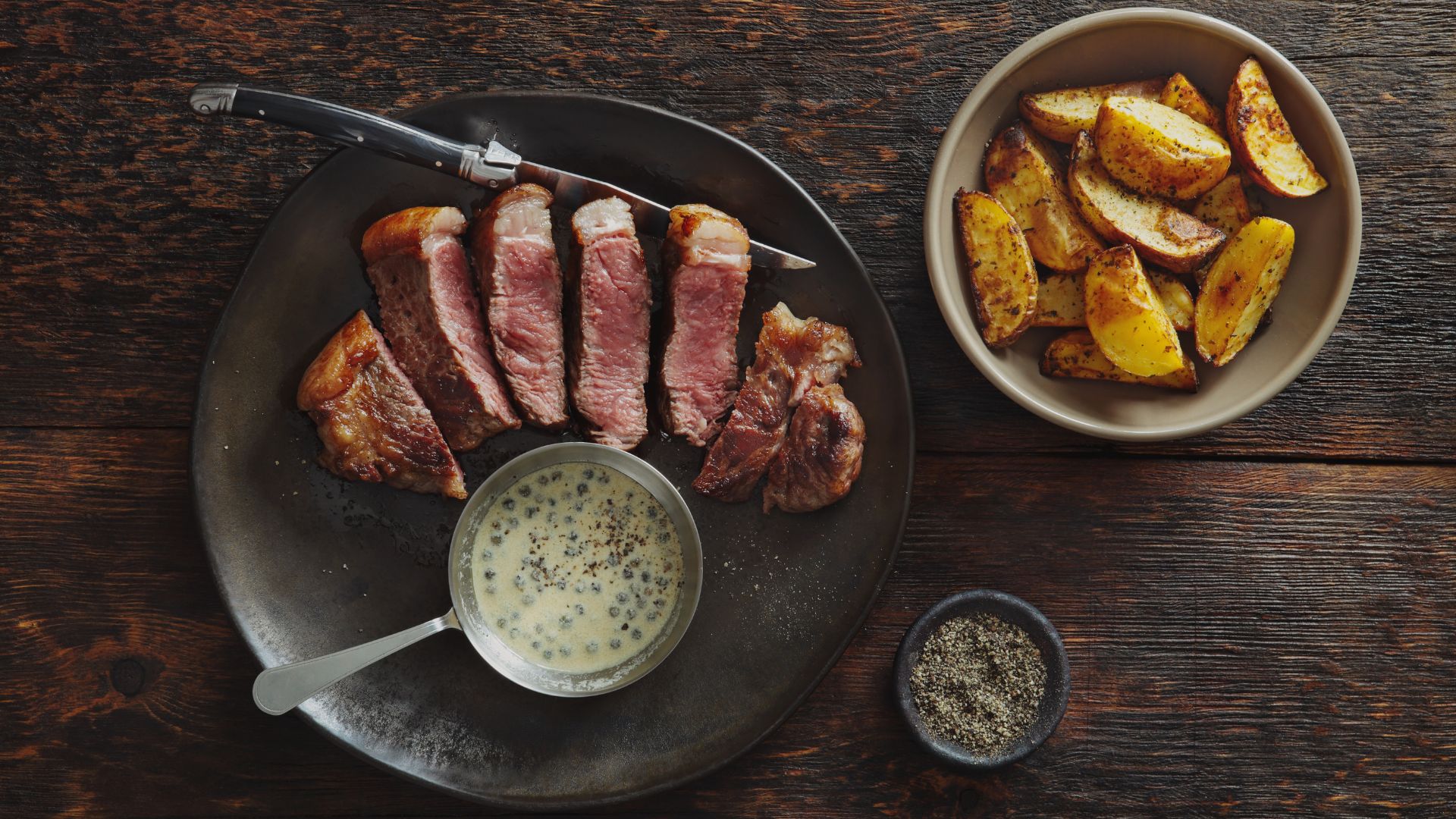 a plate of meat and potatoes